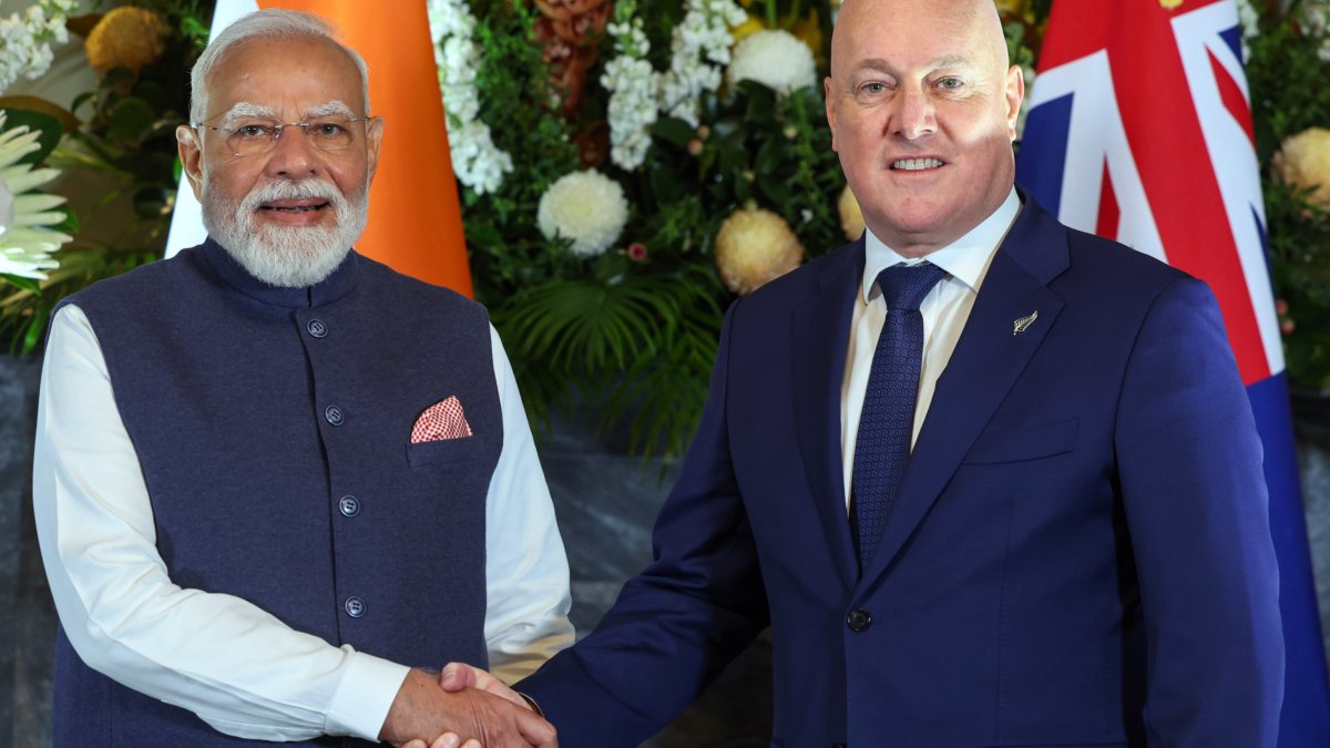 Prime Minister Narendra Modi shakes hands with New Zealand Prime Minister…