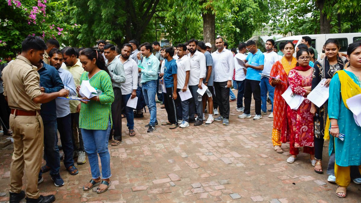 Aspirants undergo security checks before LT Grade teacher exam in Prayagraj