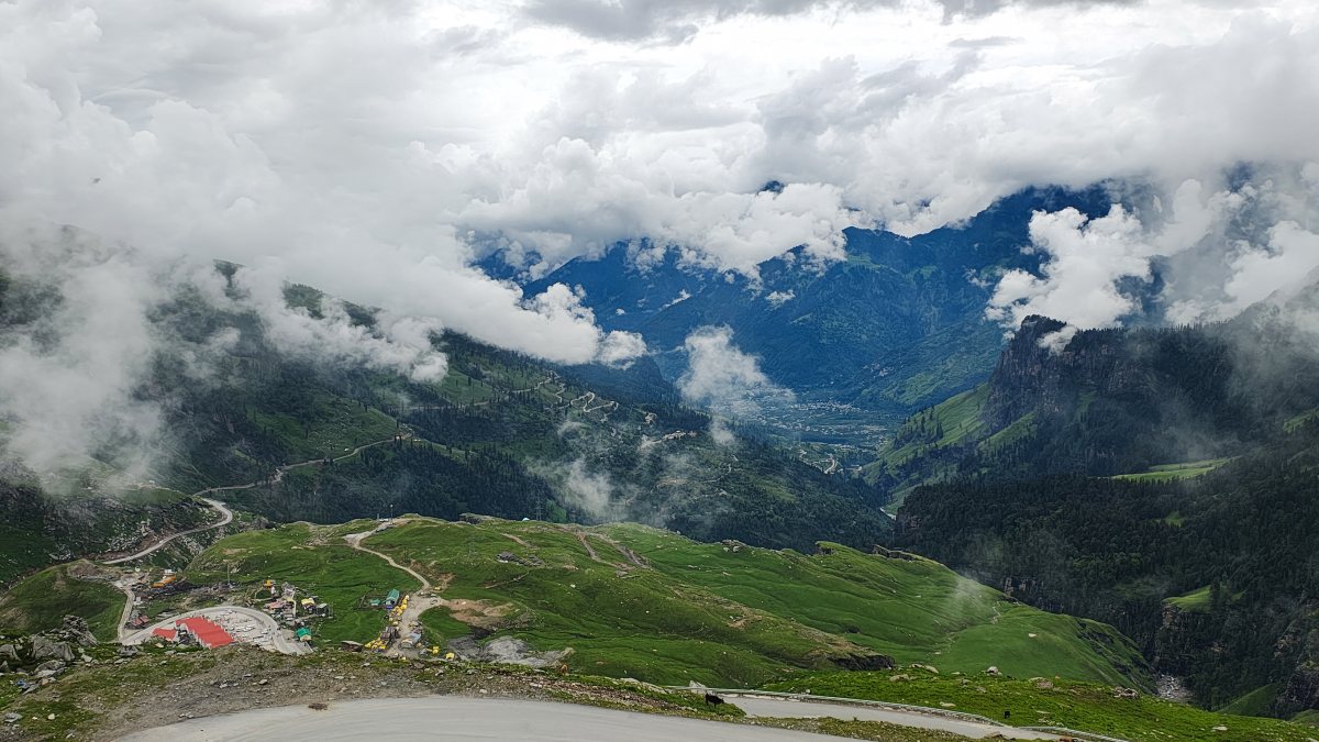 Clouds hover over Kullu hills during monsoon