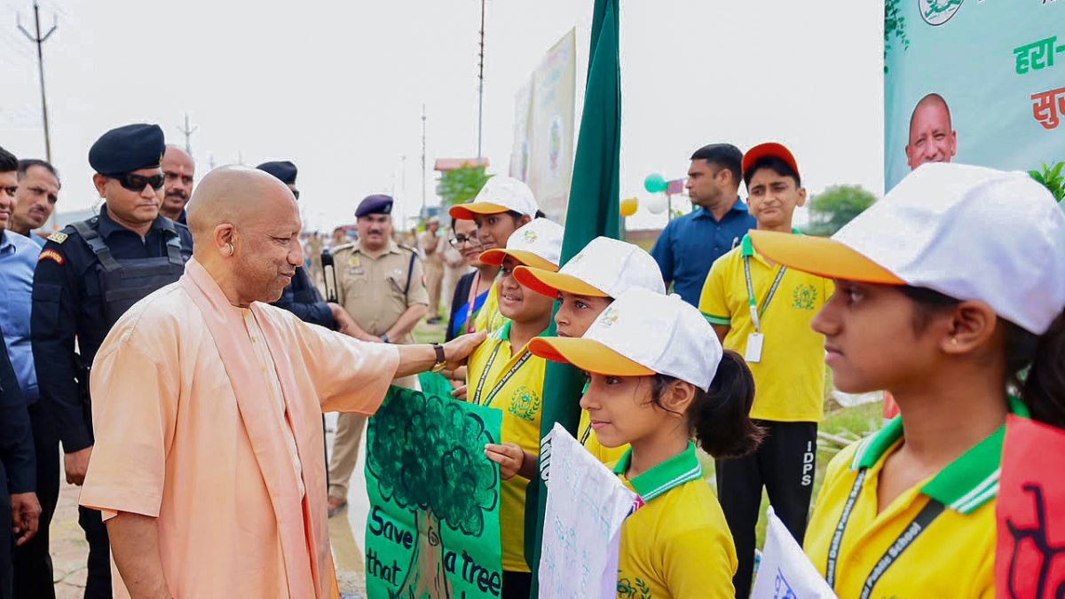 Yogi Adityanath plants saplings at Vriksharopan Mahayagya in Gorakhpur