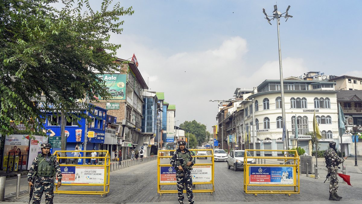 Security personnel guard Srinagar on Martyrs' Day