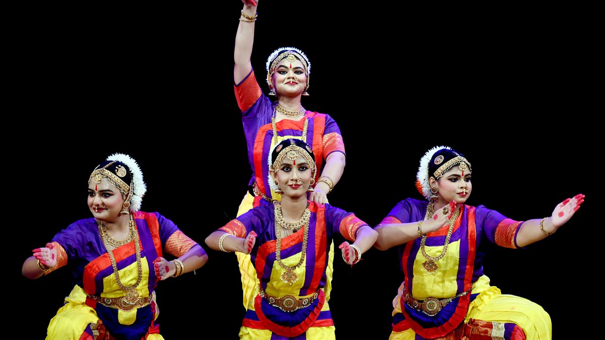 Bharatanatyam disciples perform with guru at arangetram ceremony