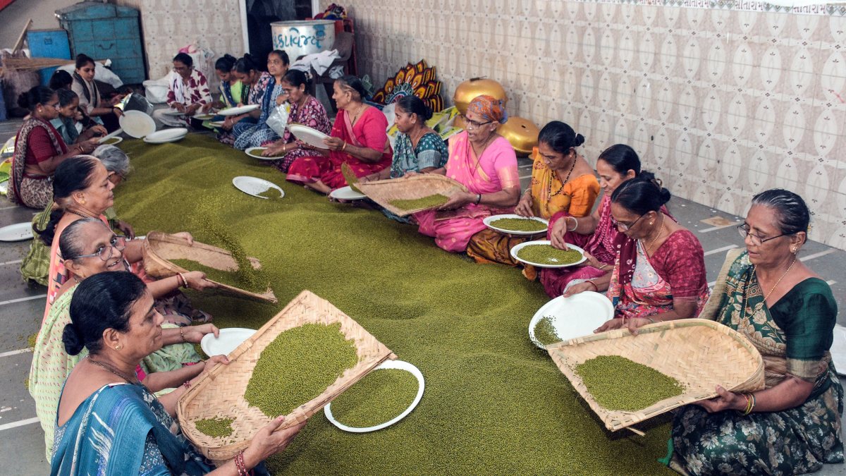 Women prepare mung prasadi for Rath Yatra in Surat
