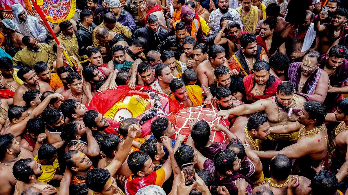 Devotees carry Goddess Subhadra during Puri Rath Yatra