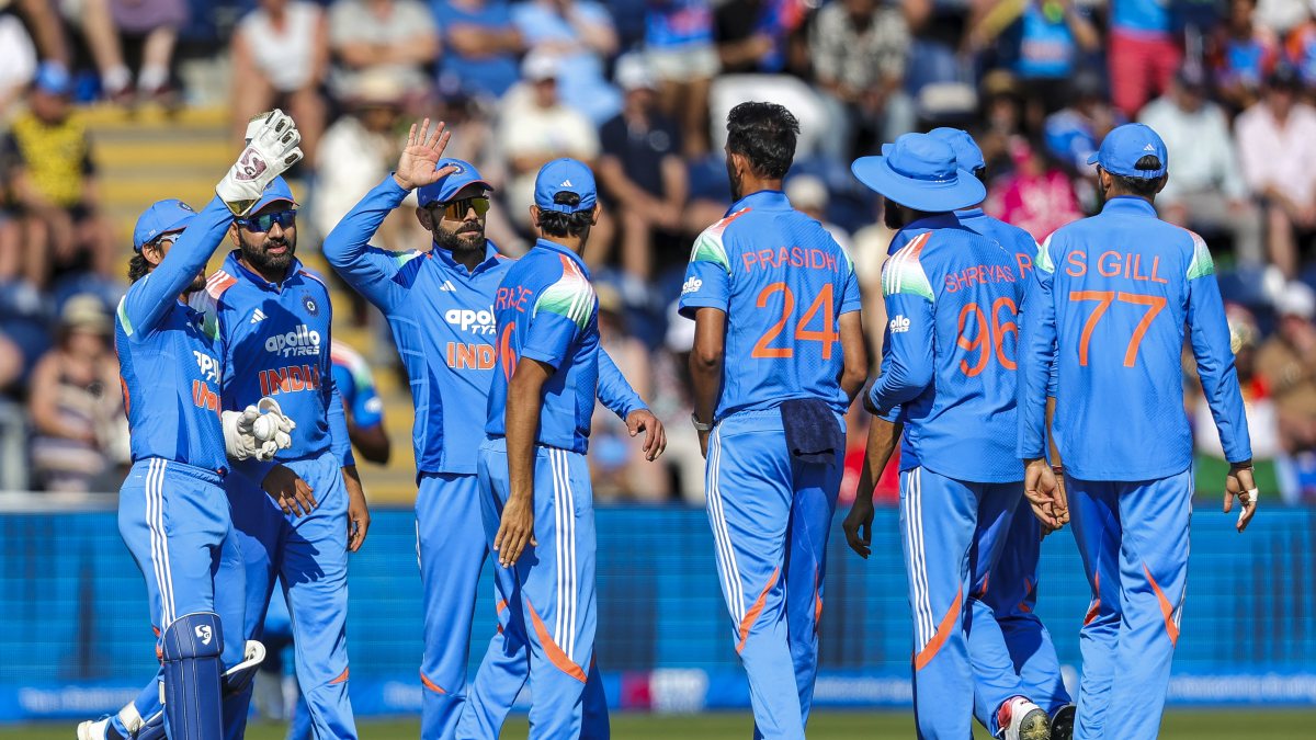 India's Prasidh Krishna celebrates wicket with teammates in Cardiff