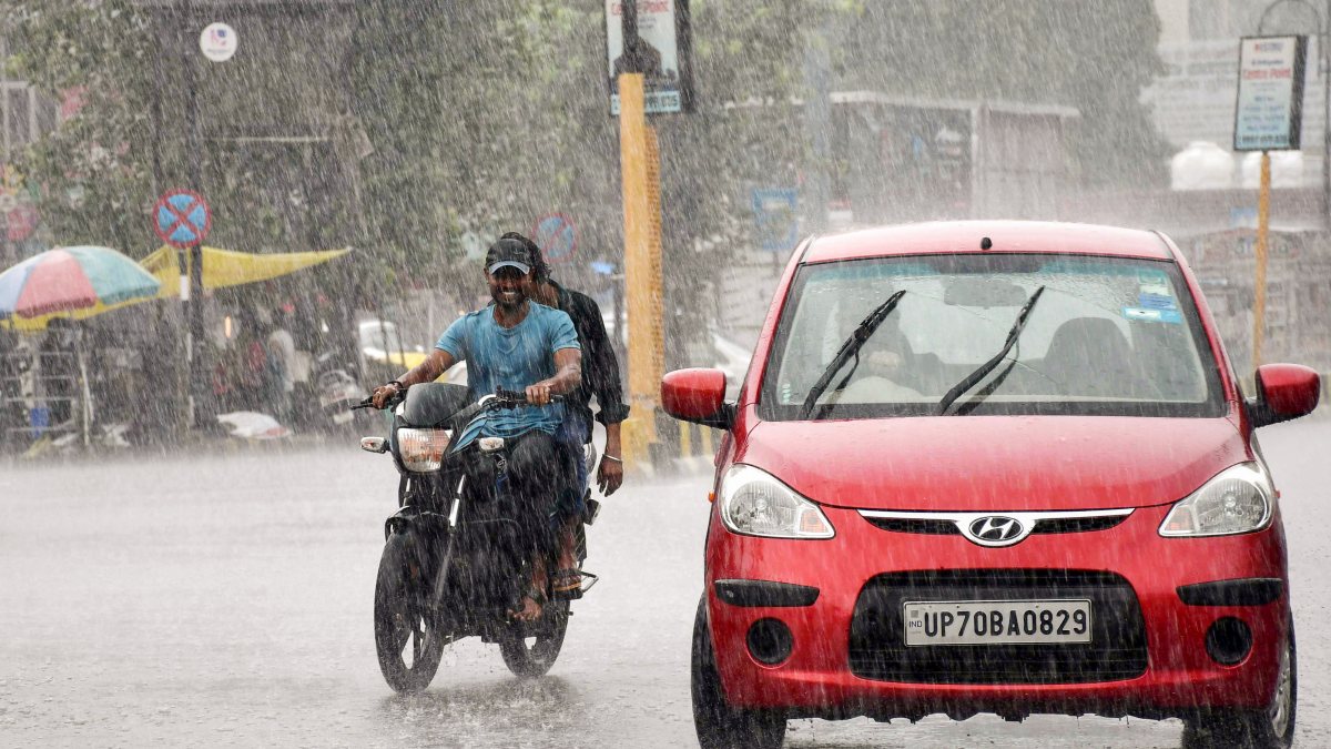 Heavy rain drenches Prayagraj, commuters navigate slick roads