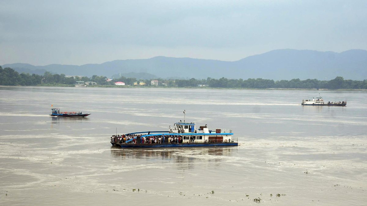 Passenger ferry navigates rising Brahmaputra River waters