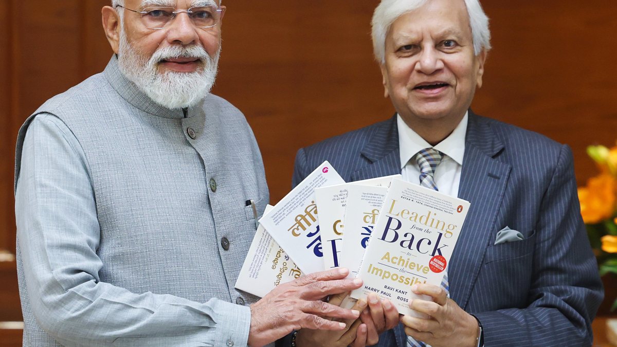 PM Modi receives book from industry leader Ravi Kant