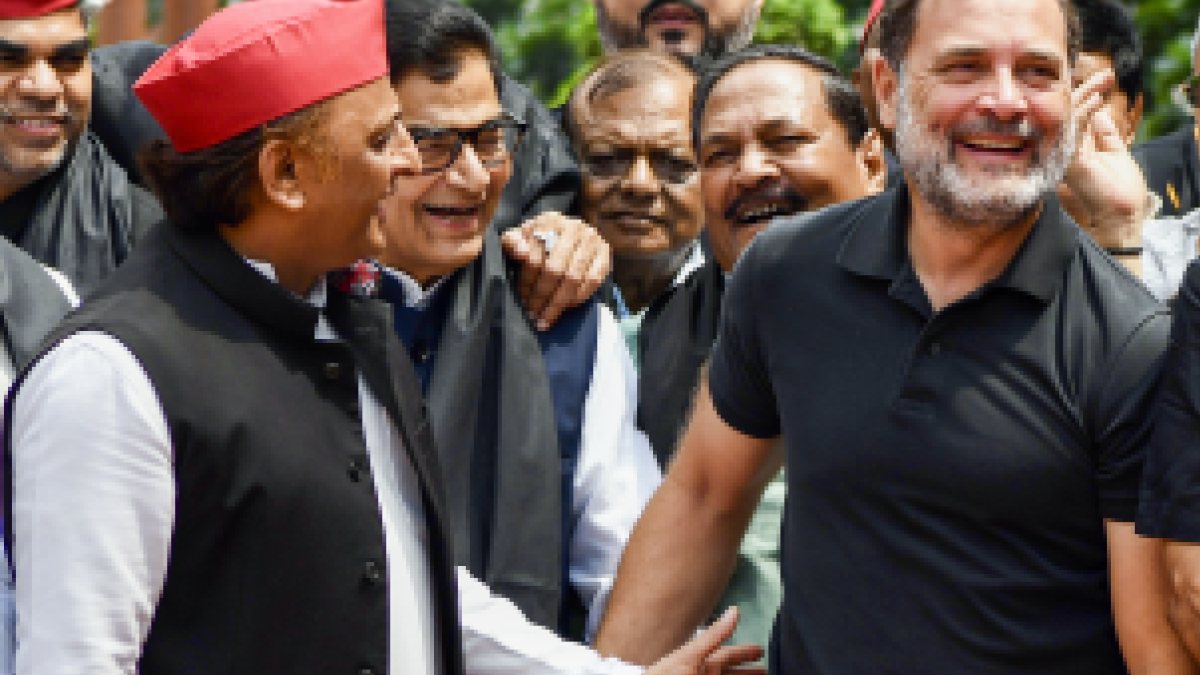 Opposition MPs protest in black outside Parliament during monsoon session