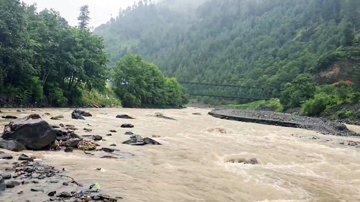 Swollen river flows through Bhalesa amid heavy rainfall in Doda