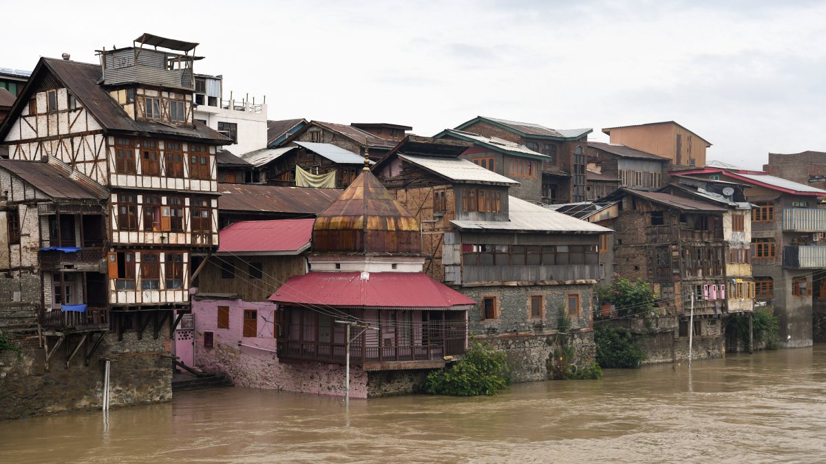 Jhelum River overflows near residential areas in Srinagar after heavy rain