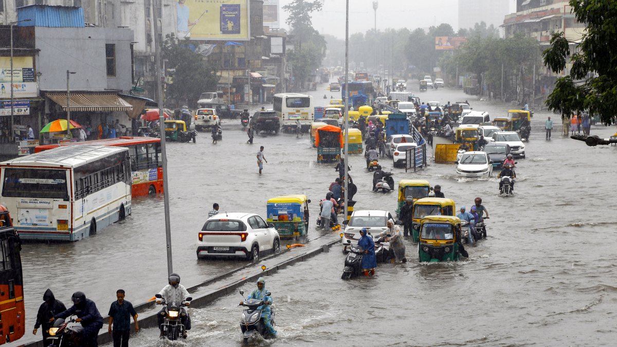 Heavy rain floods Ahmedabad roads, commuters wade through water