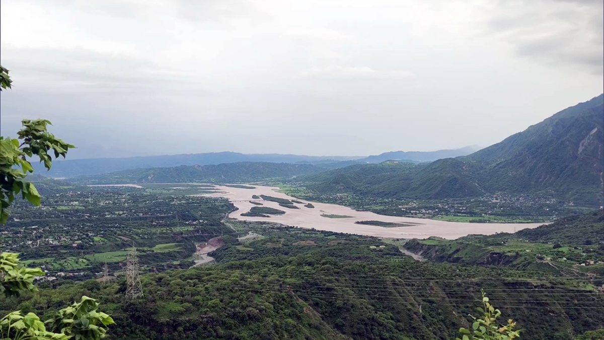 Aerial view of Salal Dam gates open as water levels rise in Reasi