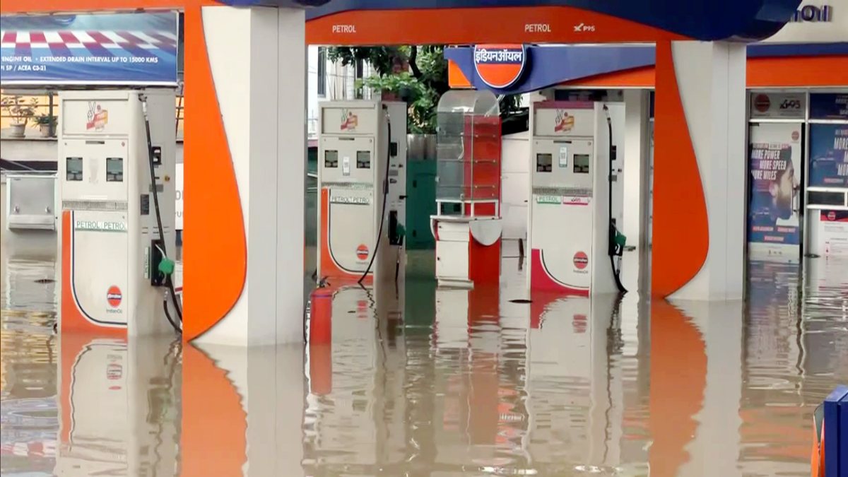 A view of a submerged petrol pump, in Guwahati on Friday. (ANI Video Grab)