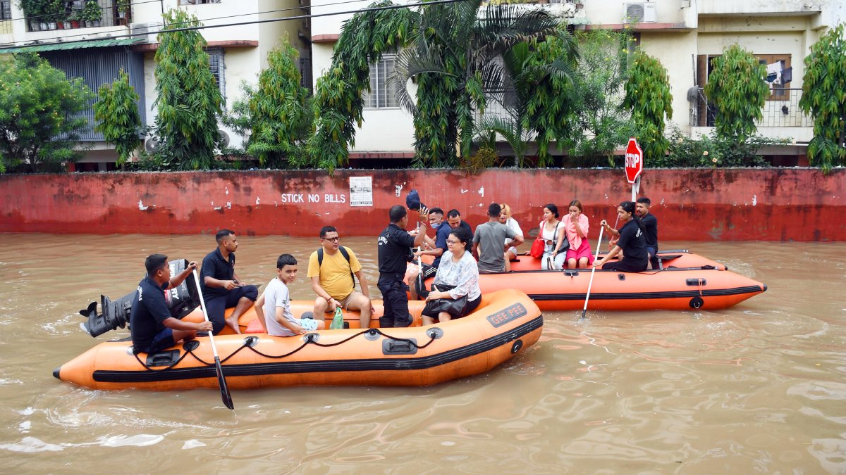 SDRF Personnel rescue people from the waterlogged area of Rukmini Gaon…