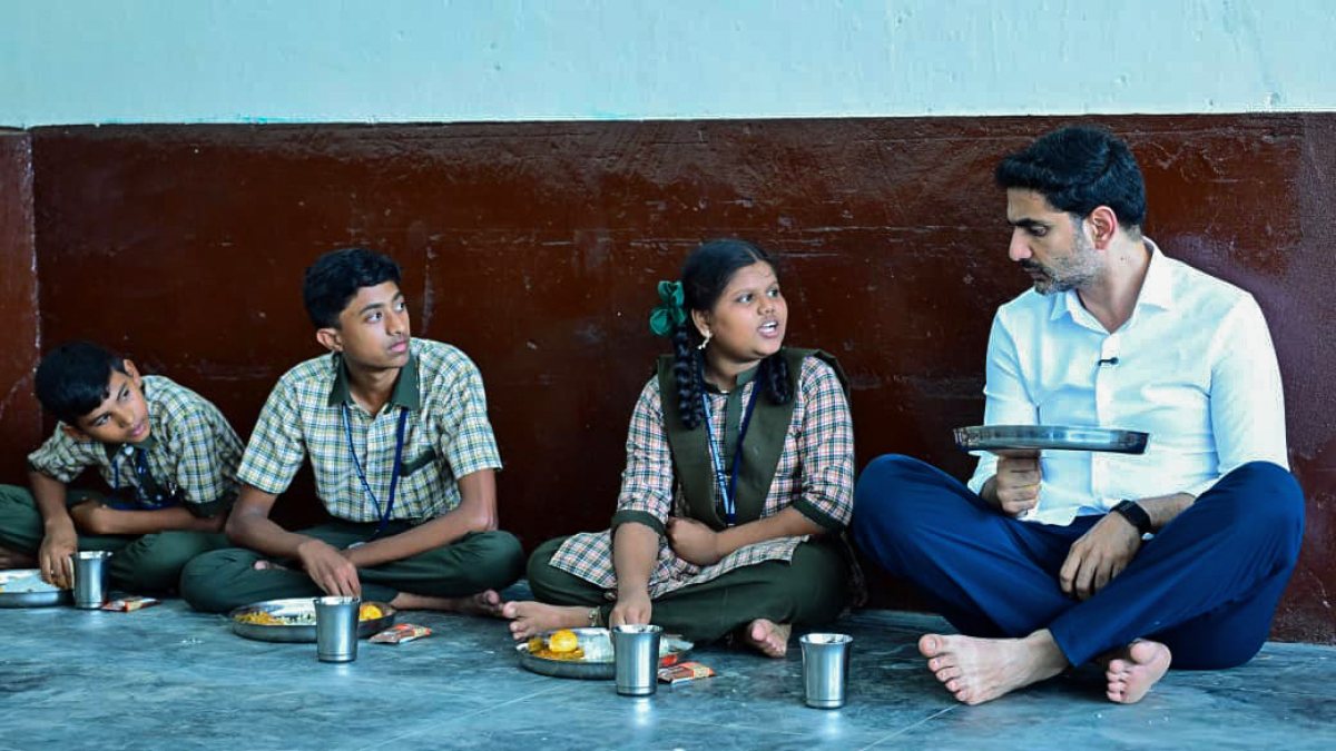 Andhra Pradesh Minister Nara Lokesh eats lunch with the students at the…