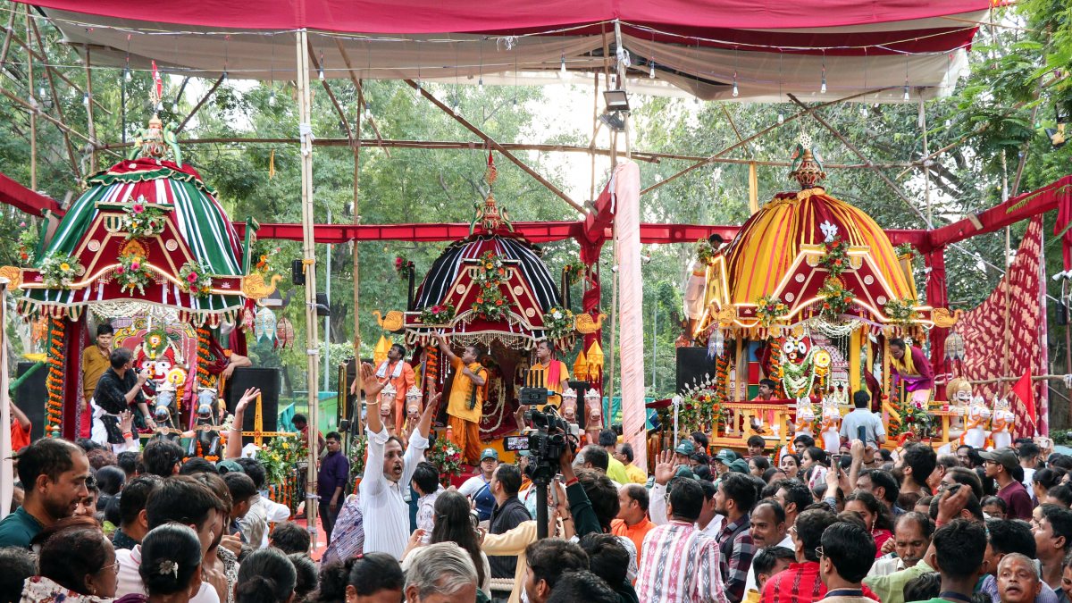Devotees take part in Jagannath Bahuda Yatra at Thyagraj Nagar, in New Delhi on…