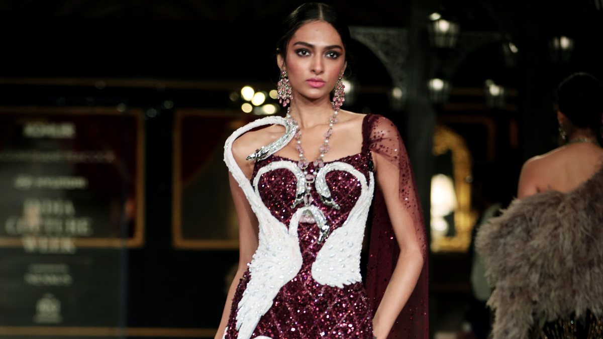 A model presents a creation by fashion designer Falguni Shane Peacock during…