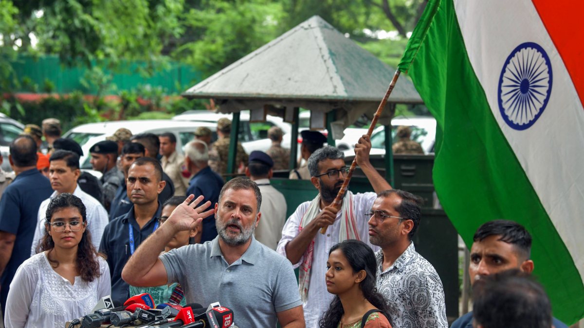 Lok Sabha LoP Rahul Gandhi, flanked by students, addresses a press conference…