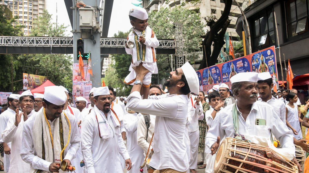 Devotees perform traditional dances and sing Abhanga and Bhajans while…