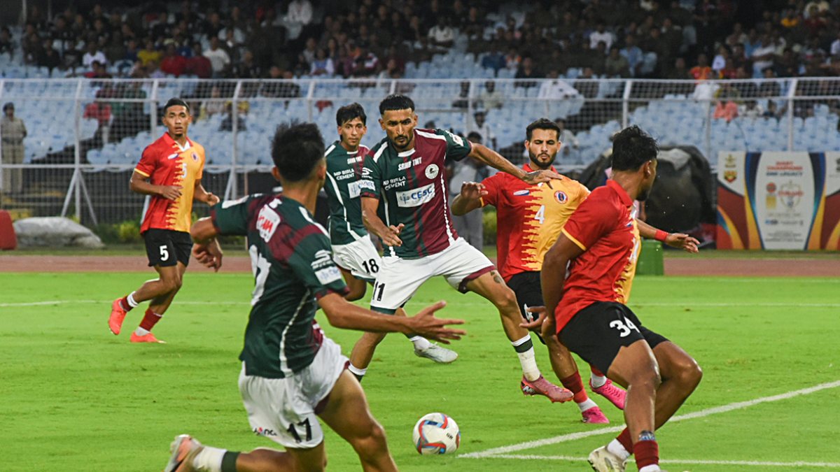Players in action during the inauguration of the match between East Bengal FC…