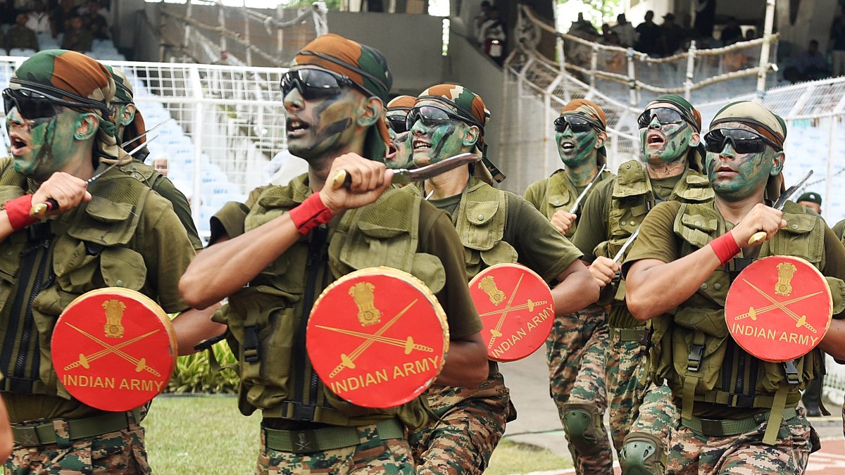 Indian Army personnel march during the inauguration of the match between East…