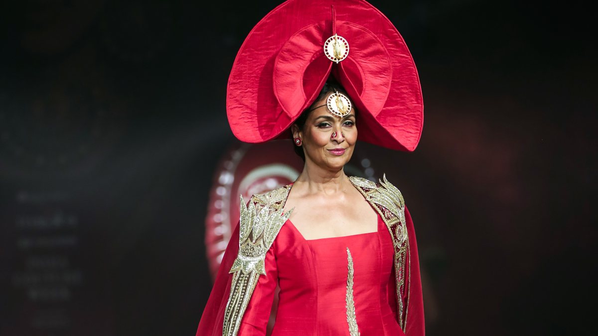 A model walks on the ramp during Day 2 of India Couture Week to showcase…