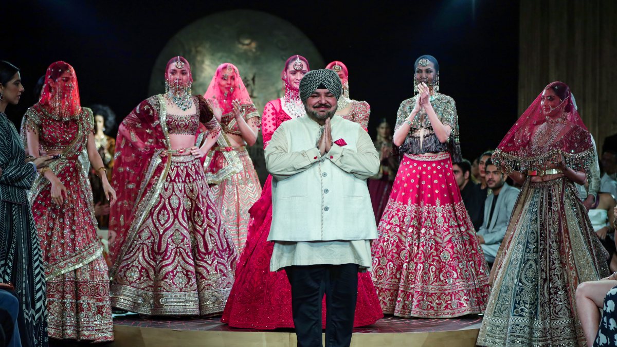 Models present creations by fashion designer J J Valaya during Day 2 of the…