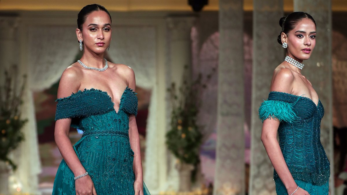 Models walk the ramp on Day 3 of India Couture Week