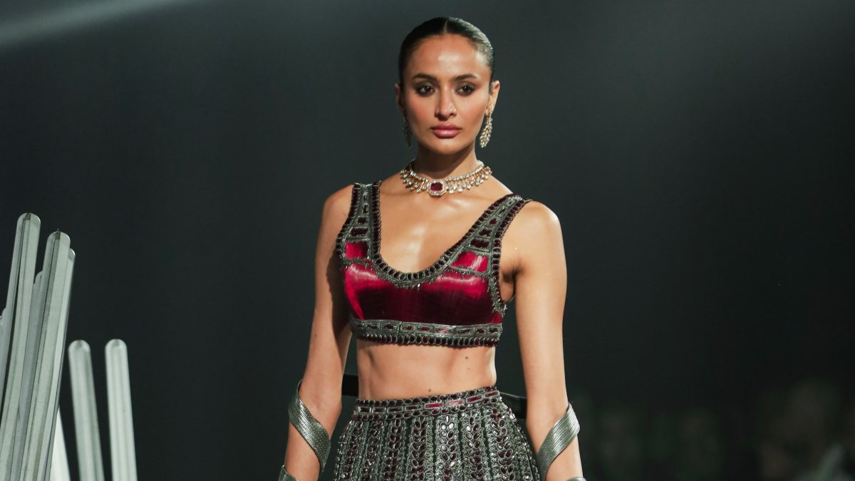 Model walks the ramp at India Couture Week Day 3