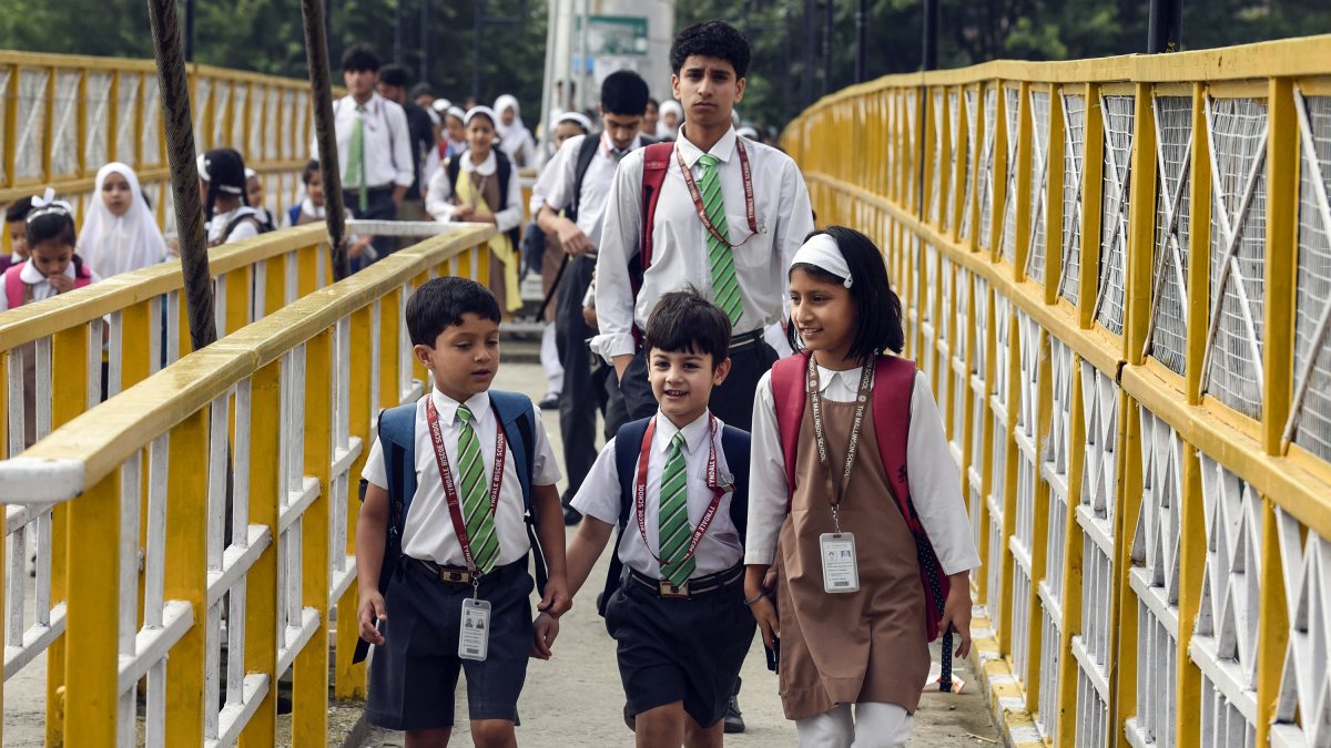 Students return to school after 21-day summer break in Srinagar
