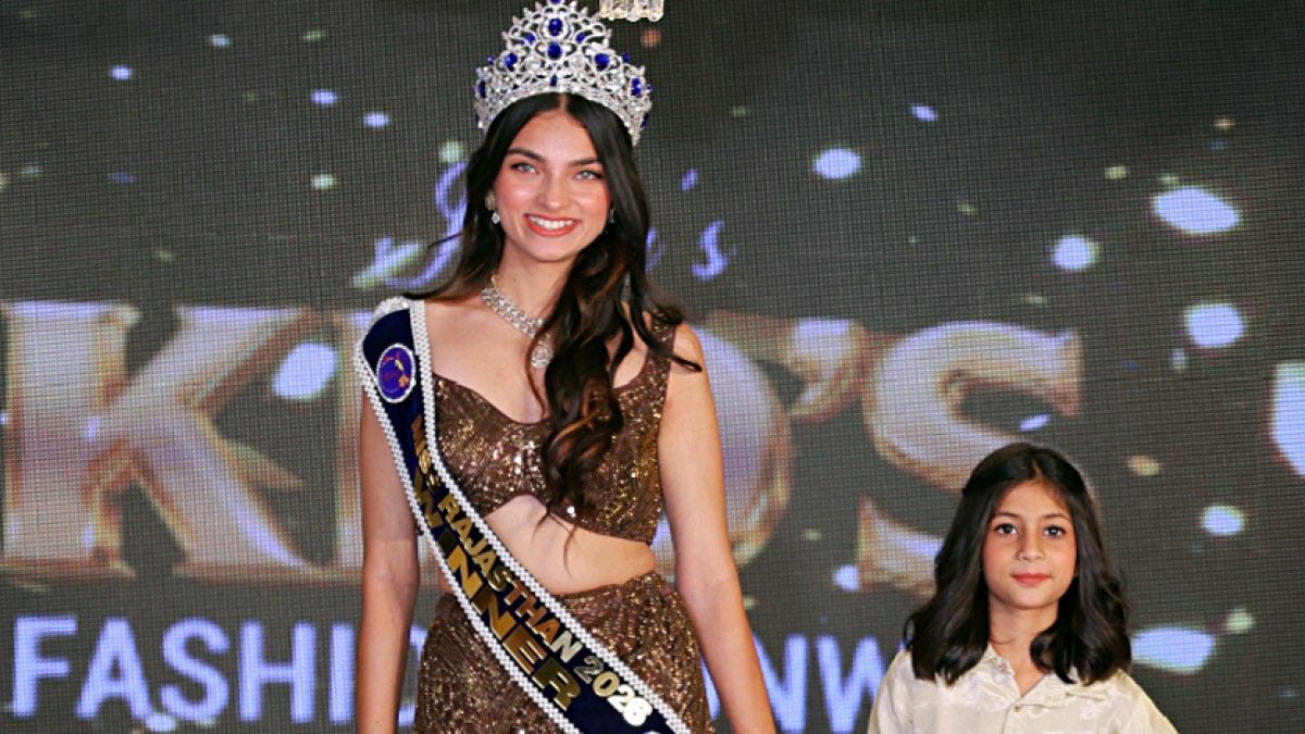 Miss Rajasthan 2026 walks ramp with child model at Jaipur fashion show
