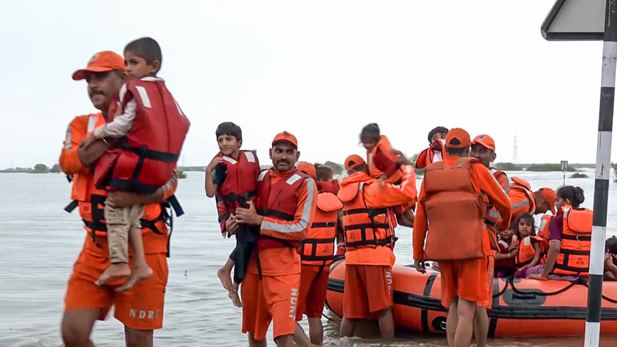 NDRF personnel rescue children in Dholera flood operation