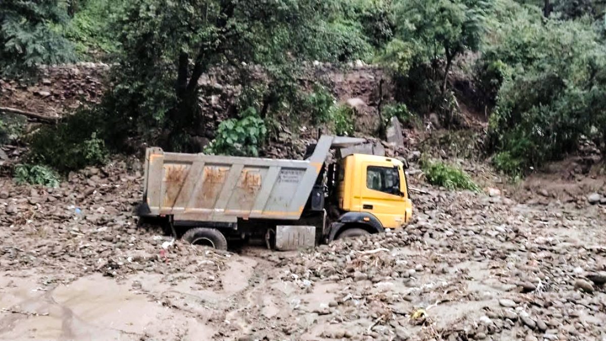 Truck stuck in debris as heavy rain lashes Himachal Pradesh