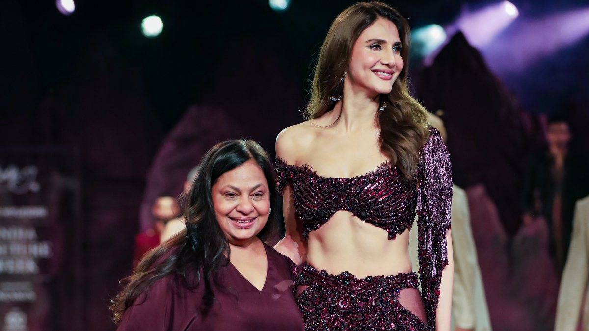 Vaani Kapoor poses with designer Dolly J at India Couture Week