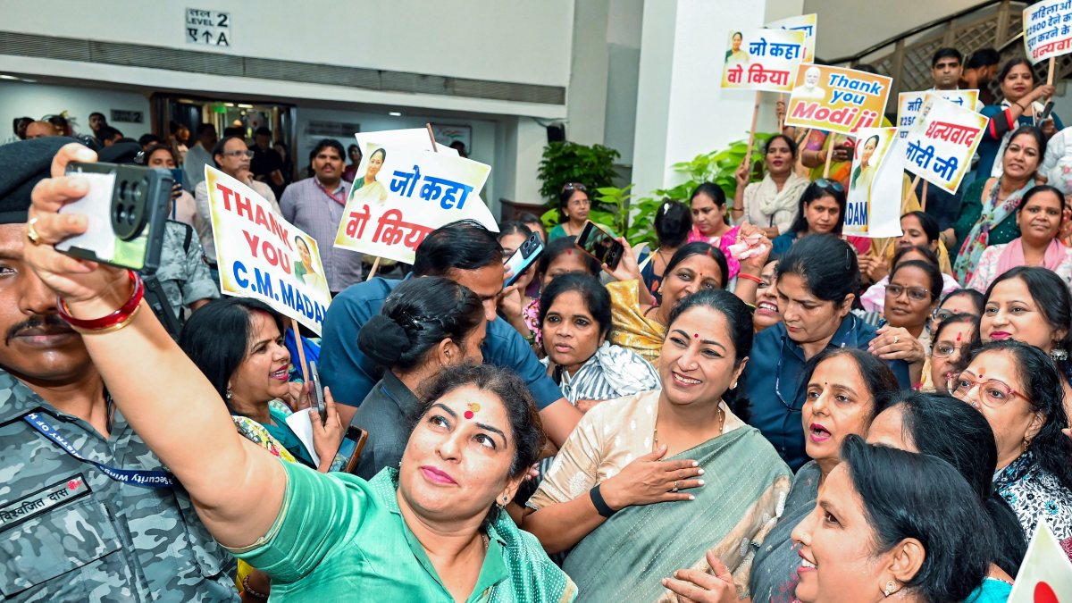 Delhi CM Rekha Gupta takes selfie with women after Lakshmi Yojana approval