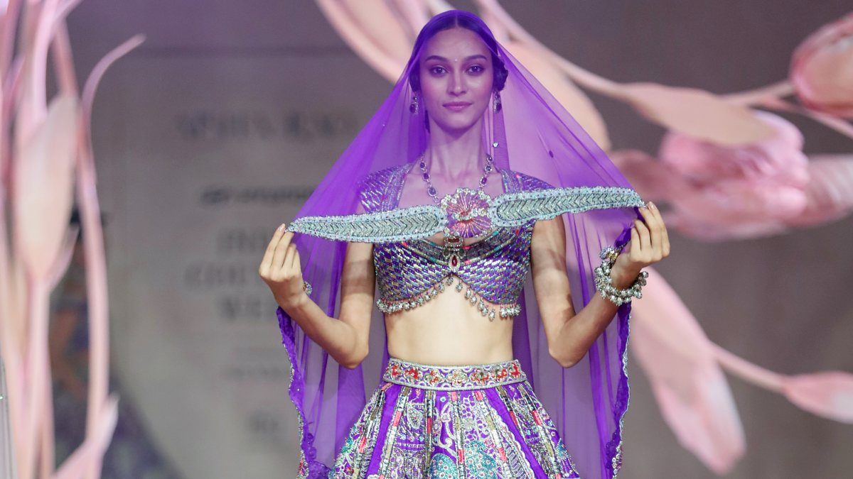 Model showcases Aisha Rao's creation at India Couture Week