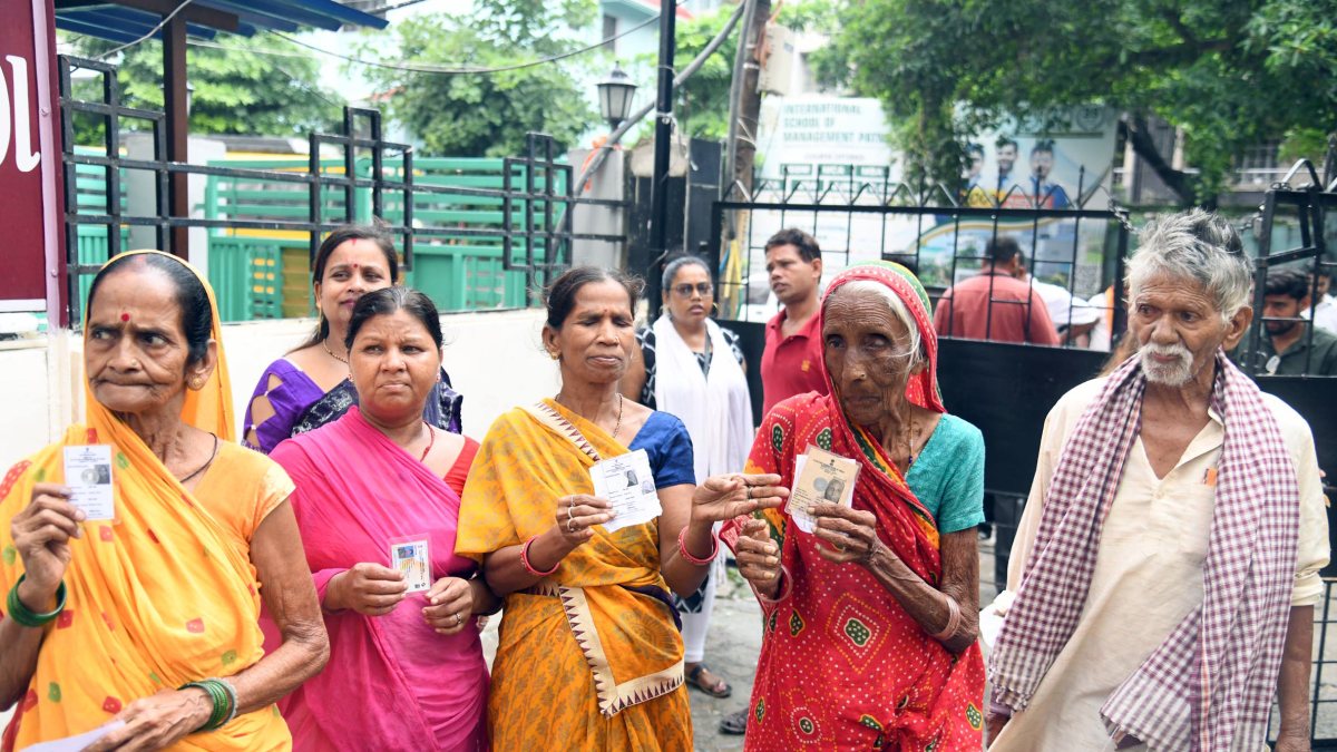 Voters show ID at Bankipur by-election polling station
