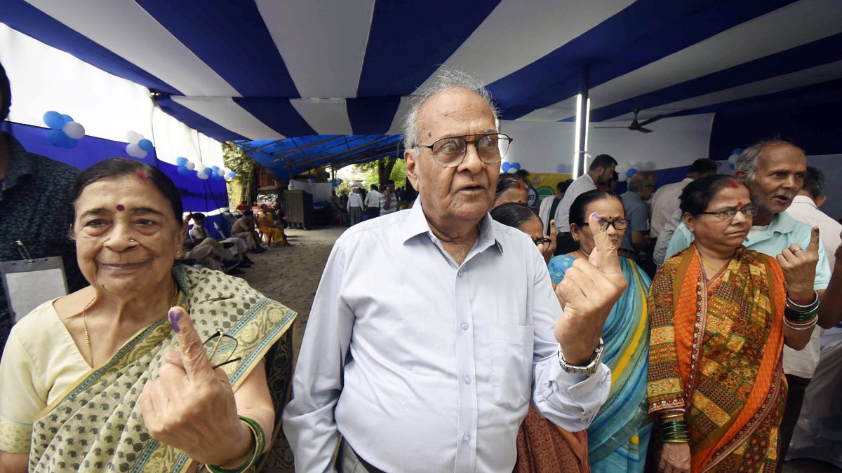Voters show inked fingers after casting ballots in Bankipur bypoll