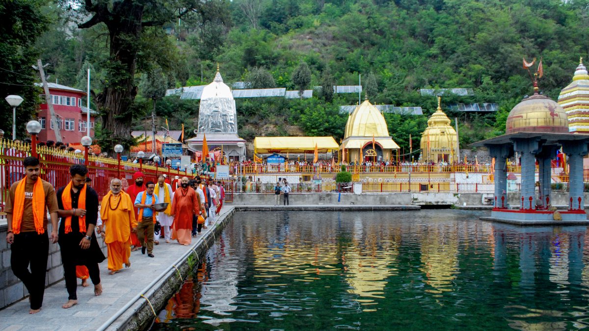 Head priest leads Sadhus in Chhari Mubarak procession at Martand Temple