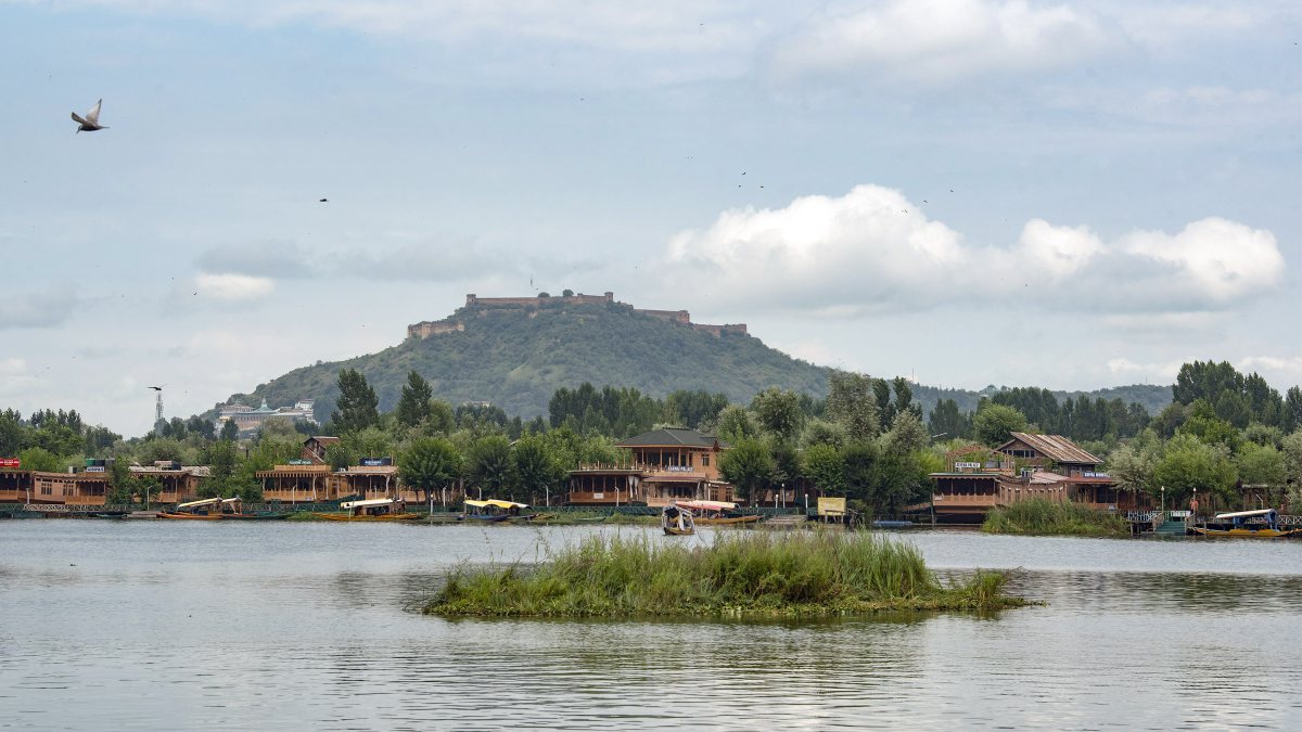 Tourists enjoy shikara ride on Dal Lake as weather improves in Srinagar