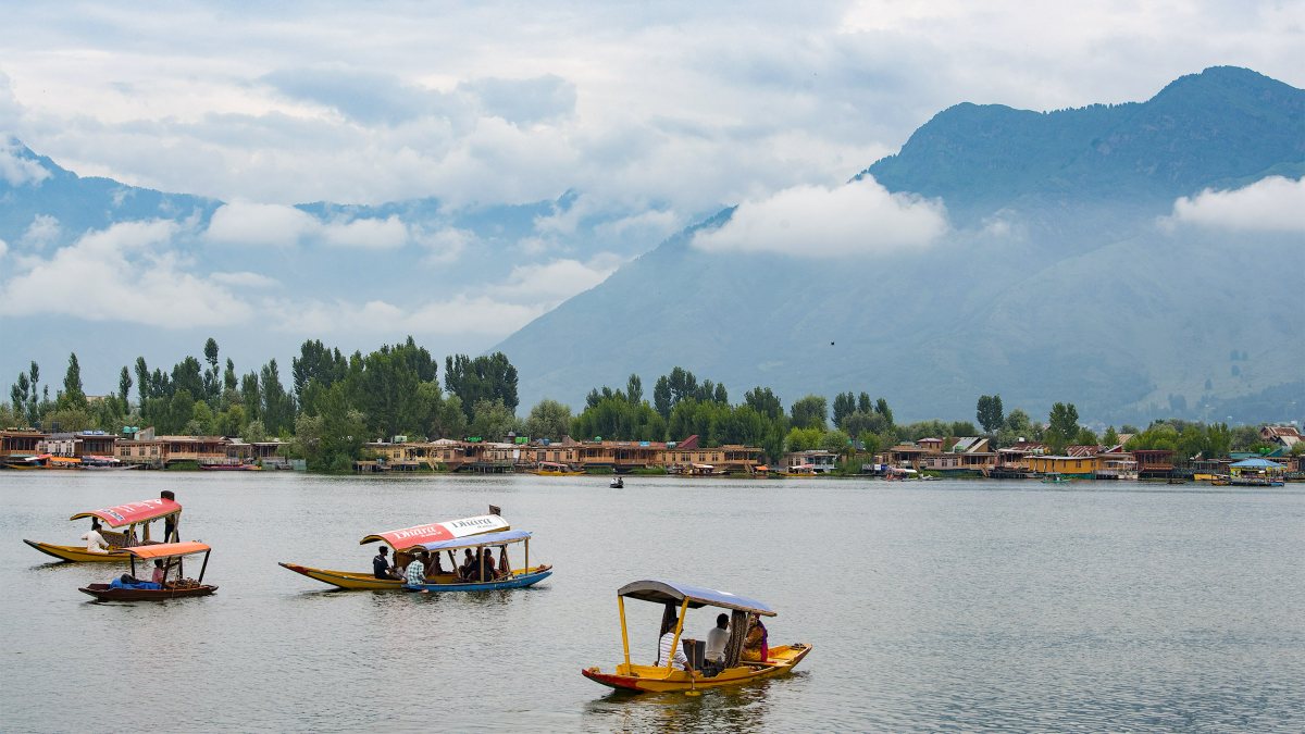Tourists enjoy shikara ride on Dal Lake as weather improves in Srinagar