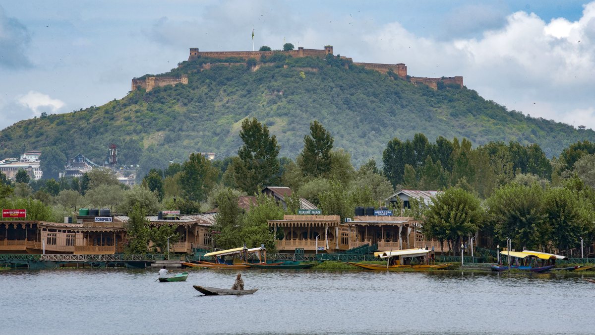 Tourists enjoy shikara ride on Dal Lake as weather improves