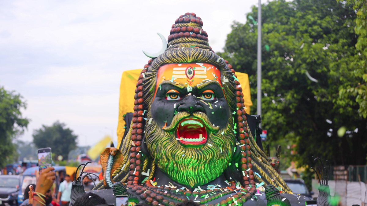 Devotees carry Lord Shiva idol during Kanwar Yatra in Haridwar
