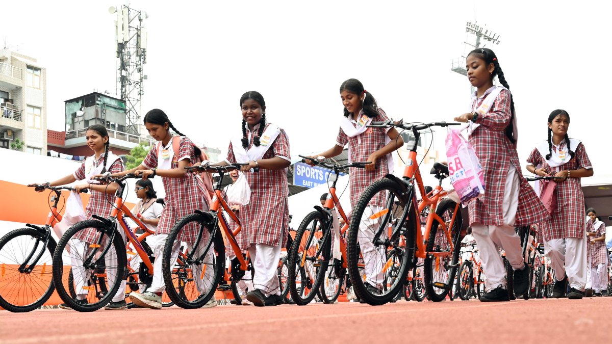 Delhi CM distributes bicycles to girl students under Vidya Vahini Yojana