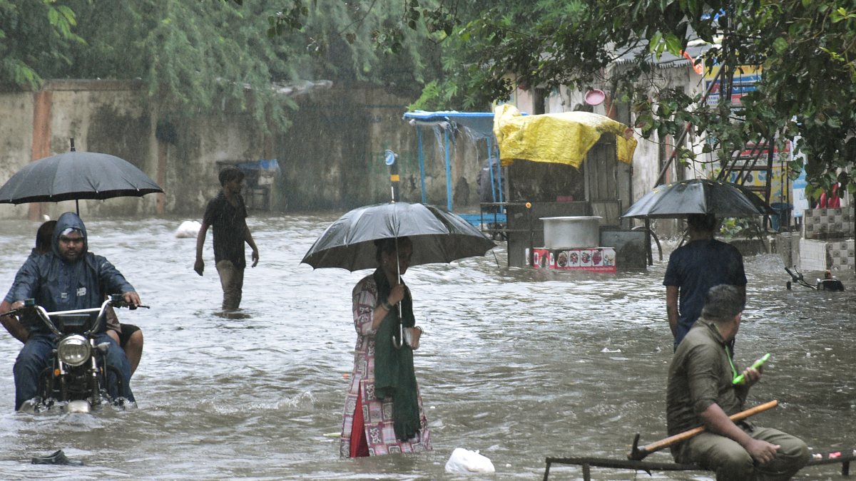 Heavy rains inundate Surat streets, residents wade through