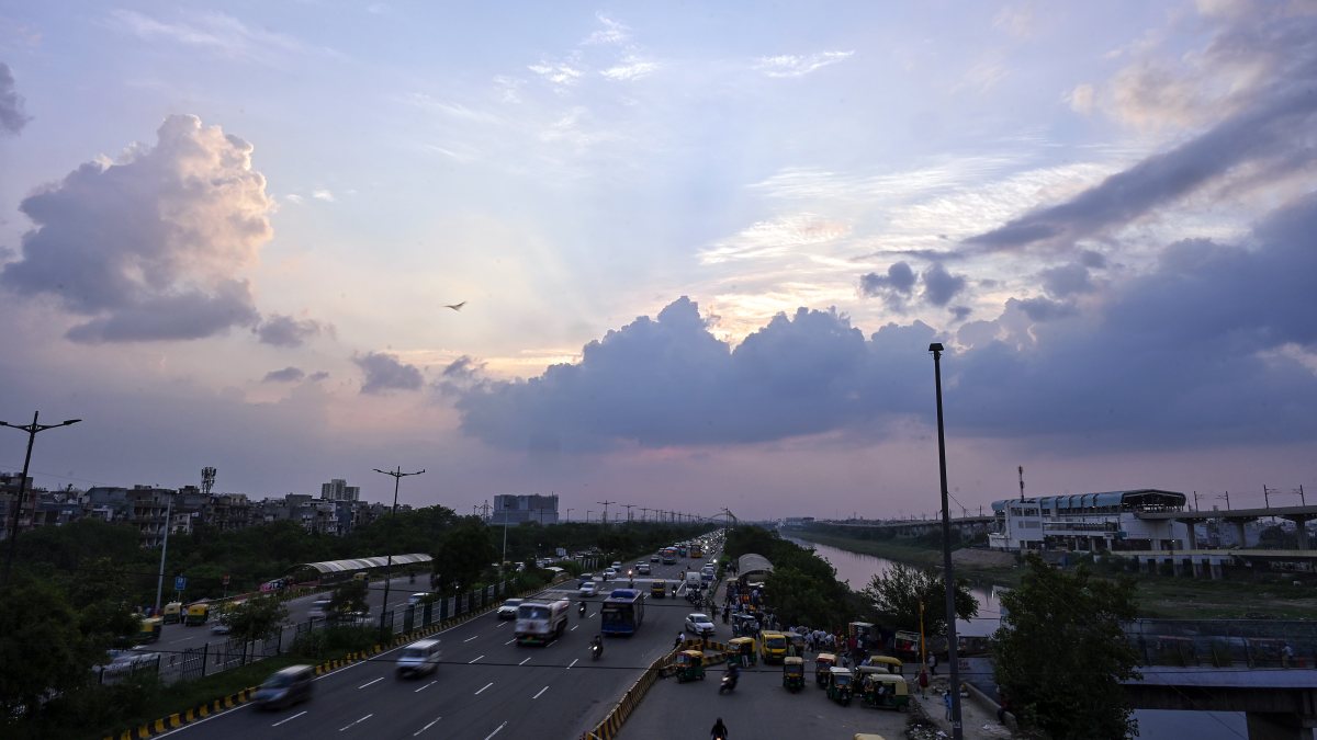 Lilac clouds hover over New Delhi sky