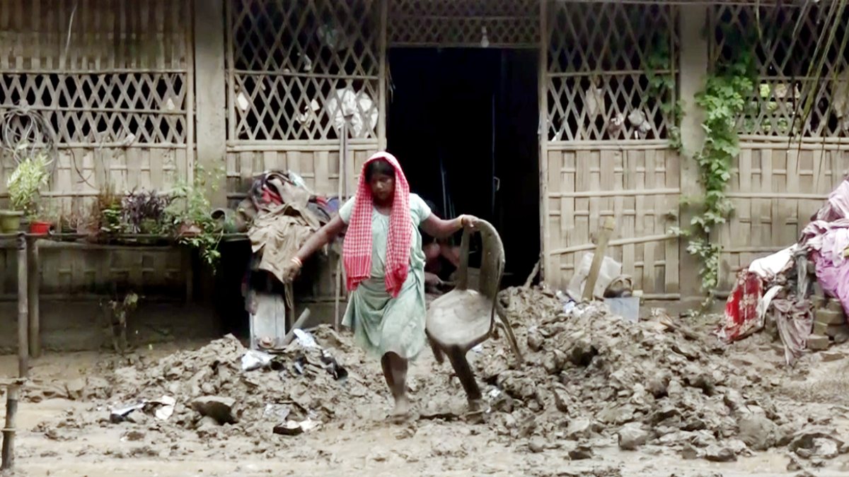 Assam flood leaves Dikhow River site under debris and sludge