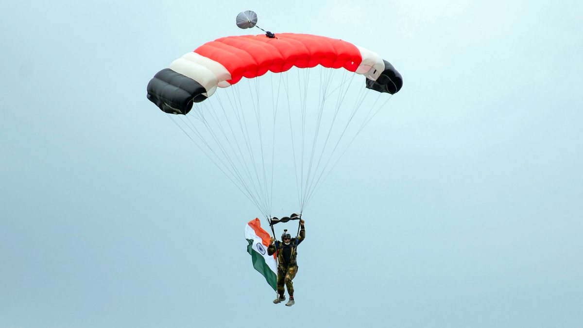 Army personnel paraglides at Durand Cup inauguration in Guwahati