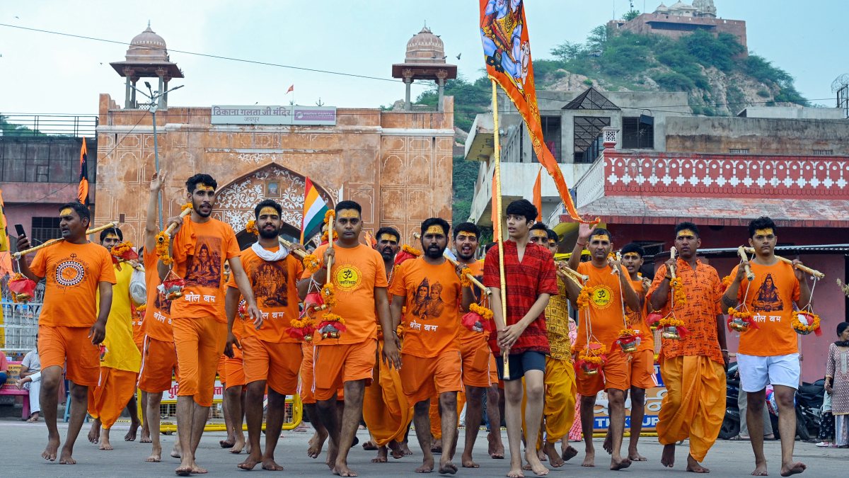 Kawariyas carry Kawad from Galtaji temple in Jaipur